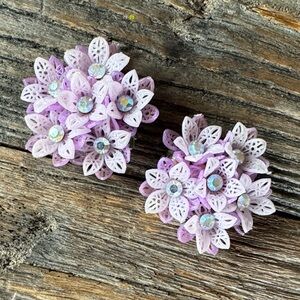 Mid Centry lavender plastic floral bunch clip earrings with rhinestone center